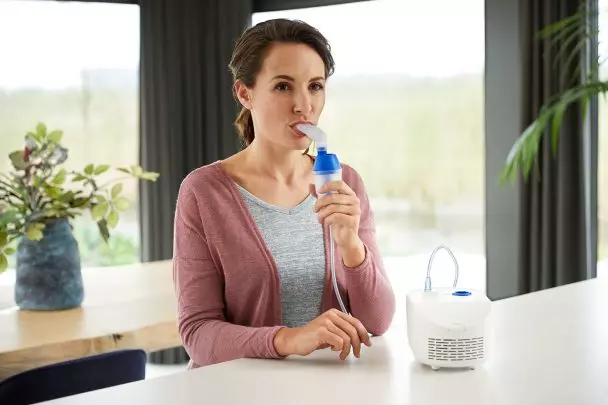 Nebulizer in Use 0413 608x405 1 Omron Healthcare